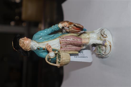 A Meissen figure of a fowler, 19th century, repaired